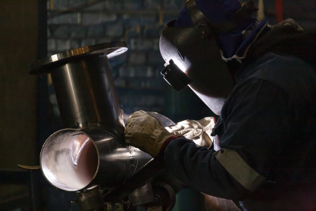 metal working fabricating a steel pipe
